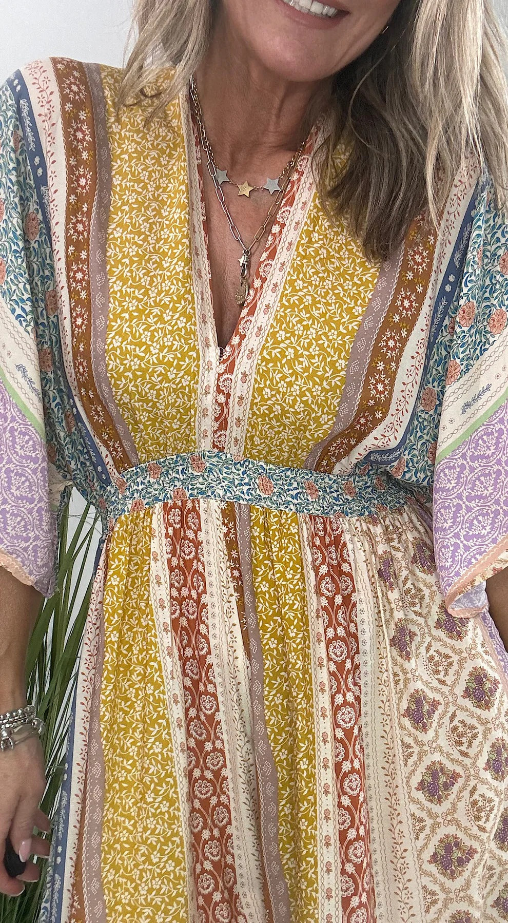 Lauren | Retro gebloemde jumpsuit -Brede mouwen, zakken, wijde broek.